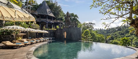 Outdoor pool, pool umbrellas, sun loungers