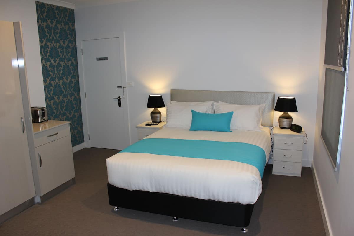 Suite Deluxe, 1 grand lit | Literie de qualité supérieure, minibar, coffres-forts dans les chambres