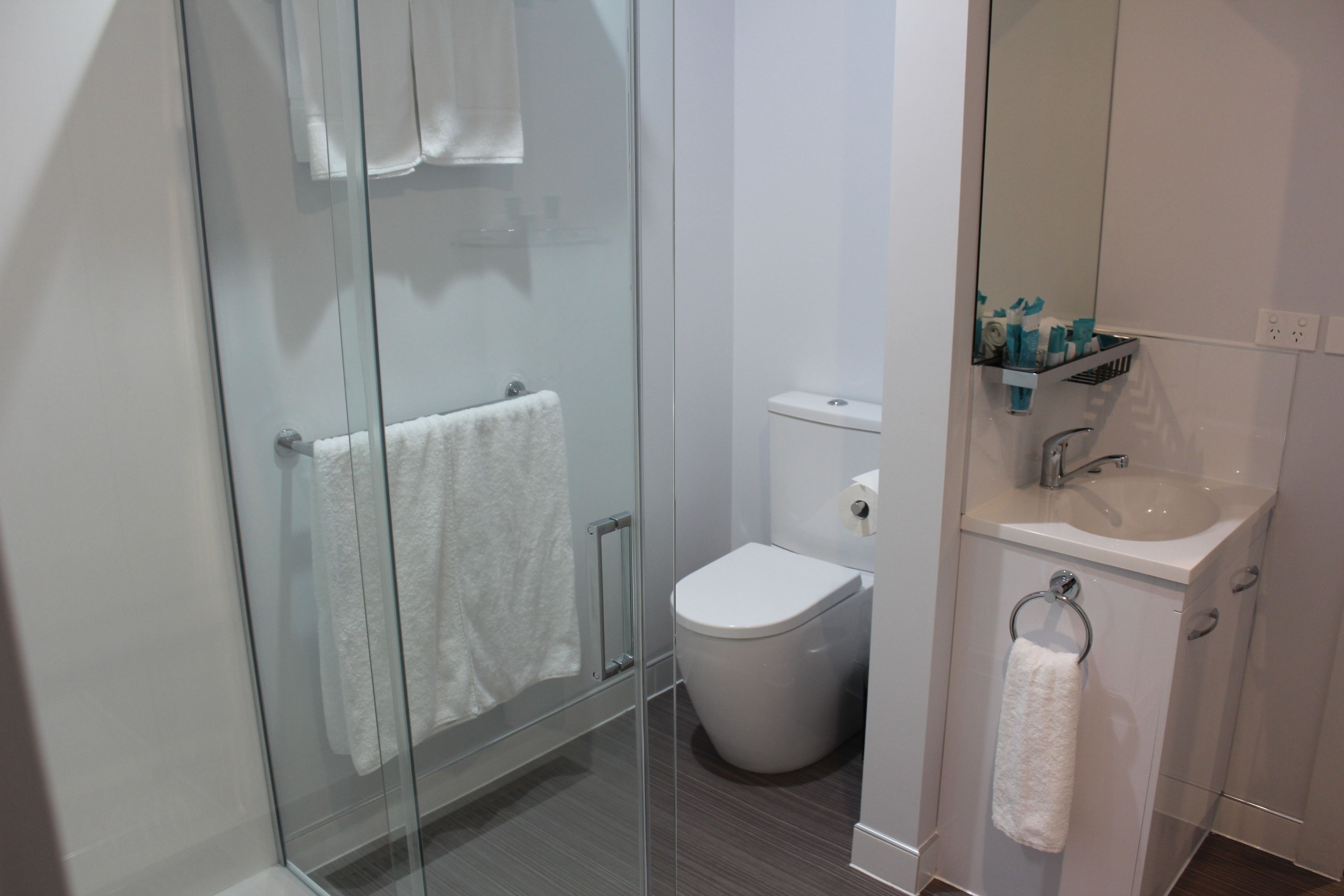 deluxe family two bedroom  | bathroom | shower, free toiletries, hair dryer, towels