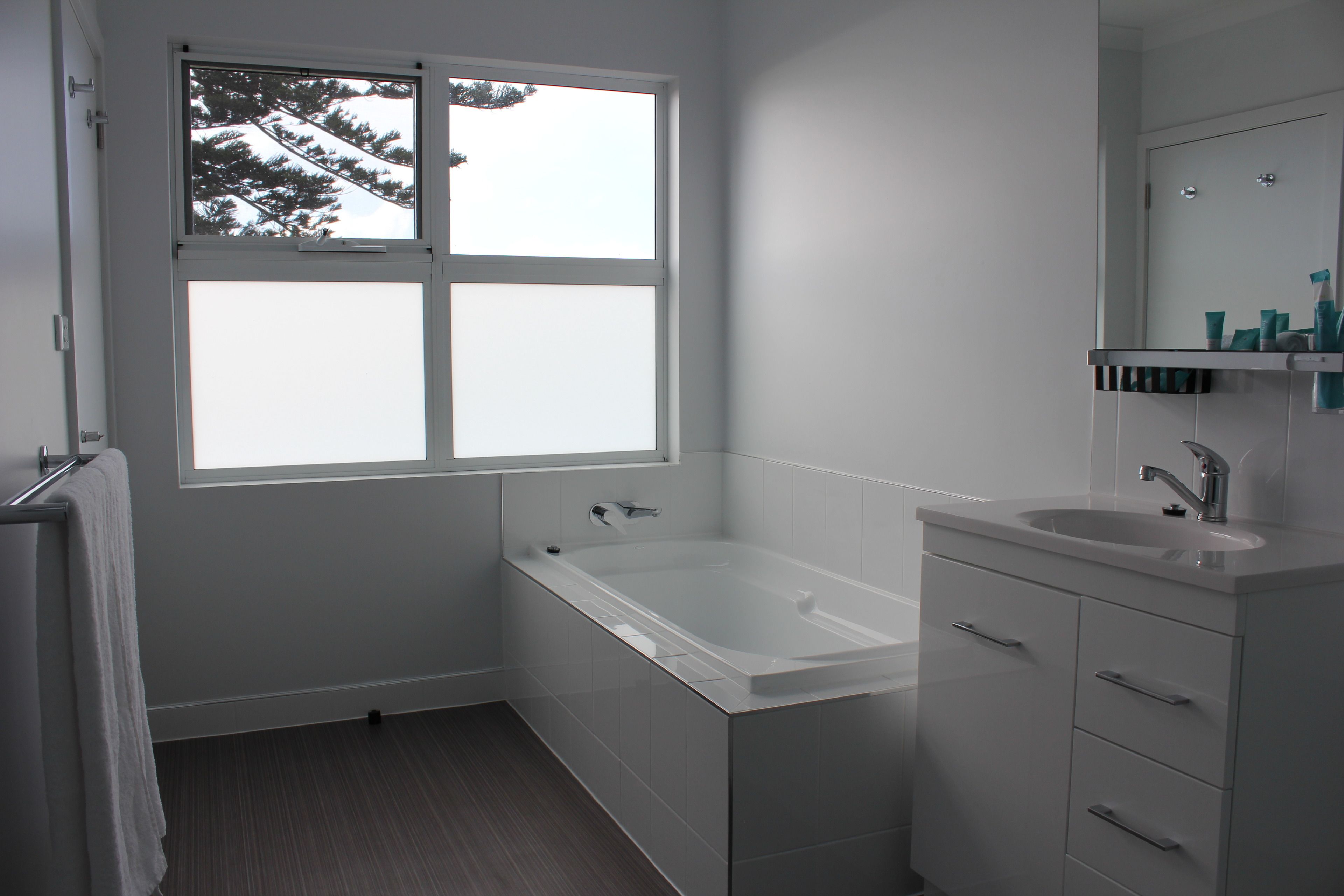 deluxe oceanfront queen  | bathroom | shower, free toiletries, hair dryer, towels