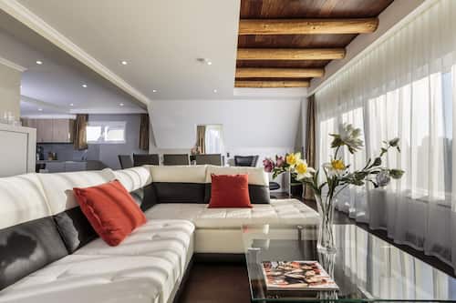 Grand Apartment, 2 Bedrooms | Living room | Flat-screen TV, DVD player