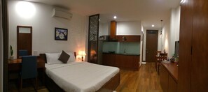 Junior Apartment | Minibar, in-room safe, desk, blackout drapes - Ocean Flower Hotel (Da Nang)