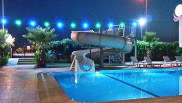 Outdoor pool, pool umbrellas, sun loungers