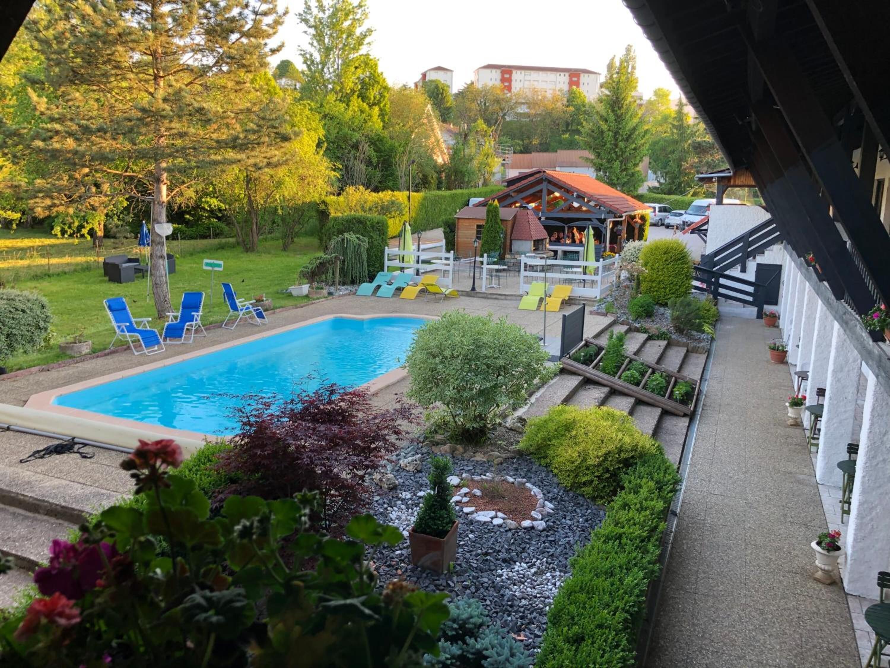 seasonal outdoor pool, open 10:00 am to 10:00 pm, pool umbrellas
