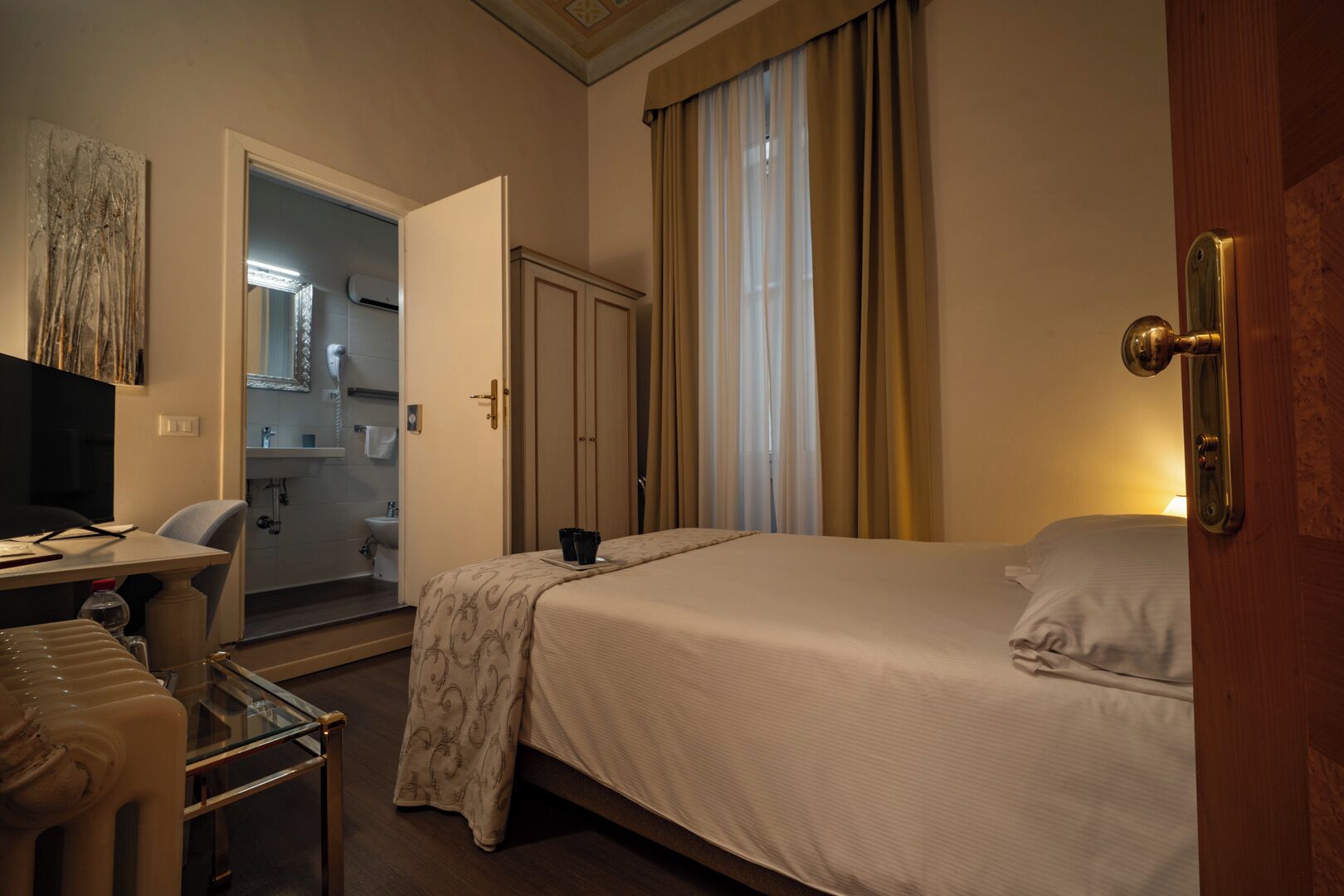 Premium bedding, down duvets, in-room safe, desk