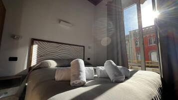 Habitación Confort con 1 cama doble o 2 individuales | 1 dormitorio, ropa de cama de alta calidad, edredones de plumas