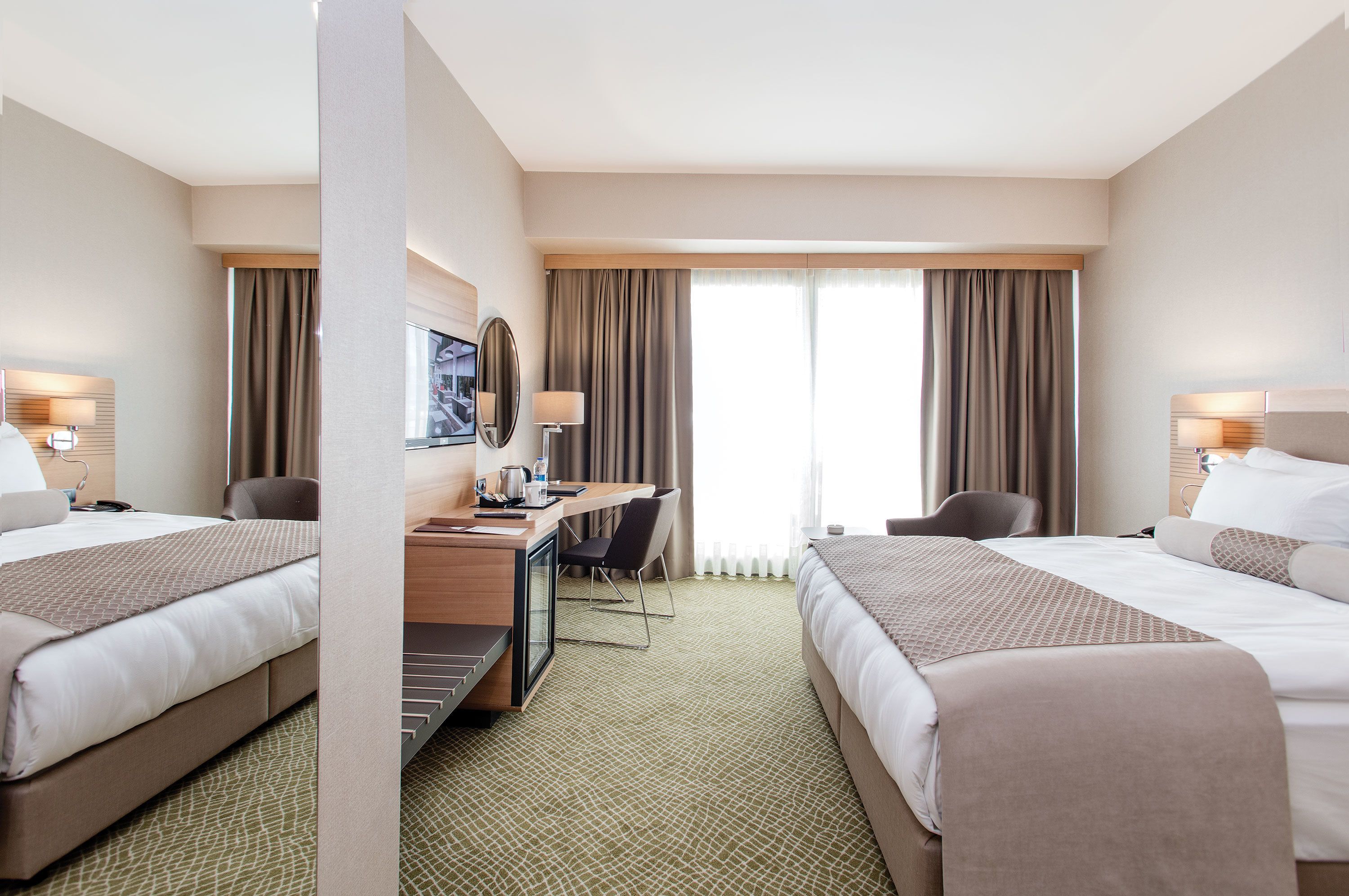 deluxe room, city view | 1 bedroom, premium bedding, minibar, in-room safe
