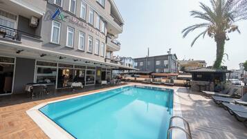 Outdoor pool, sun loungers