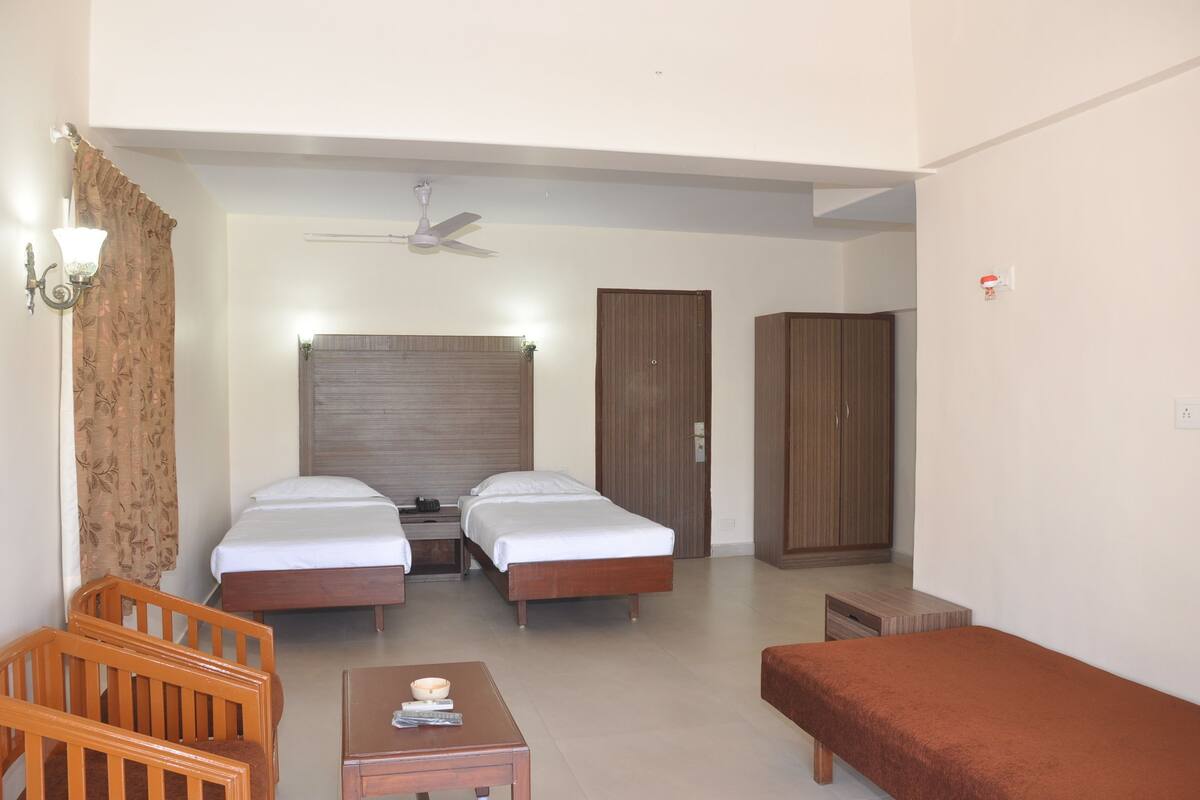 Premium bedding, desk, iron/ironing board, rollaway beds
