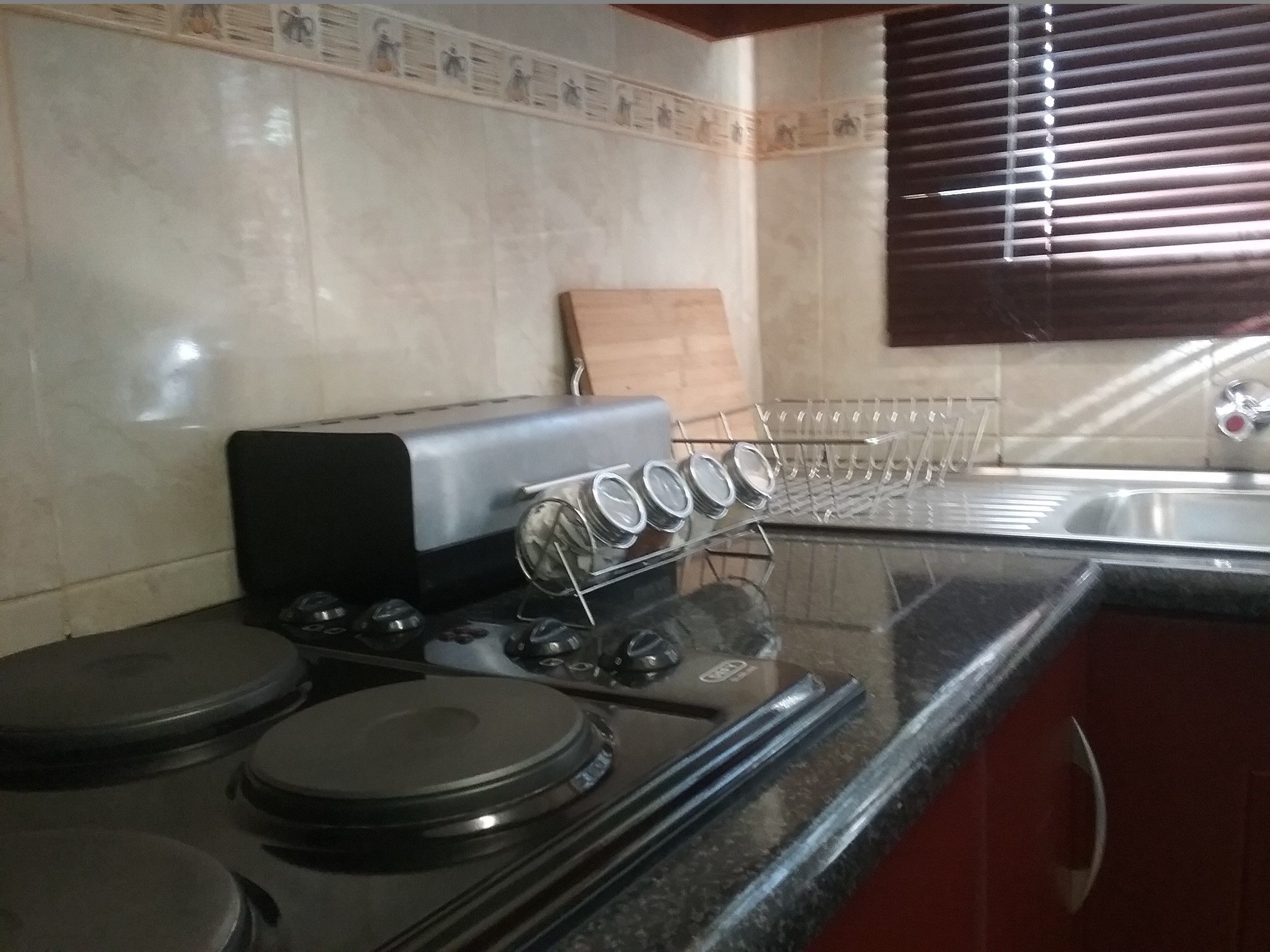 Full-size fridge, microwave, stovetop, coffee/tea maker