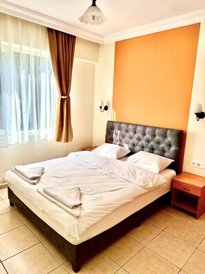 標準公寓, 1 間臥室, 廚房, 花園景觀 | 高級寢具、客房內保險箱、書桌、隔音