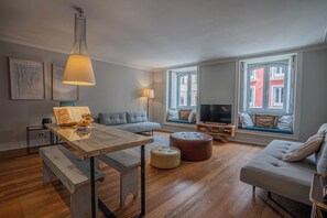 Deluxe Apartment, 1 Bedroom (6 Guests) | Living area | 32-inch flat-screen TV with cable channels, TV