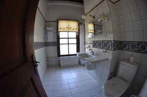 Shower, free toiletries, hair dryer, slippers