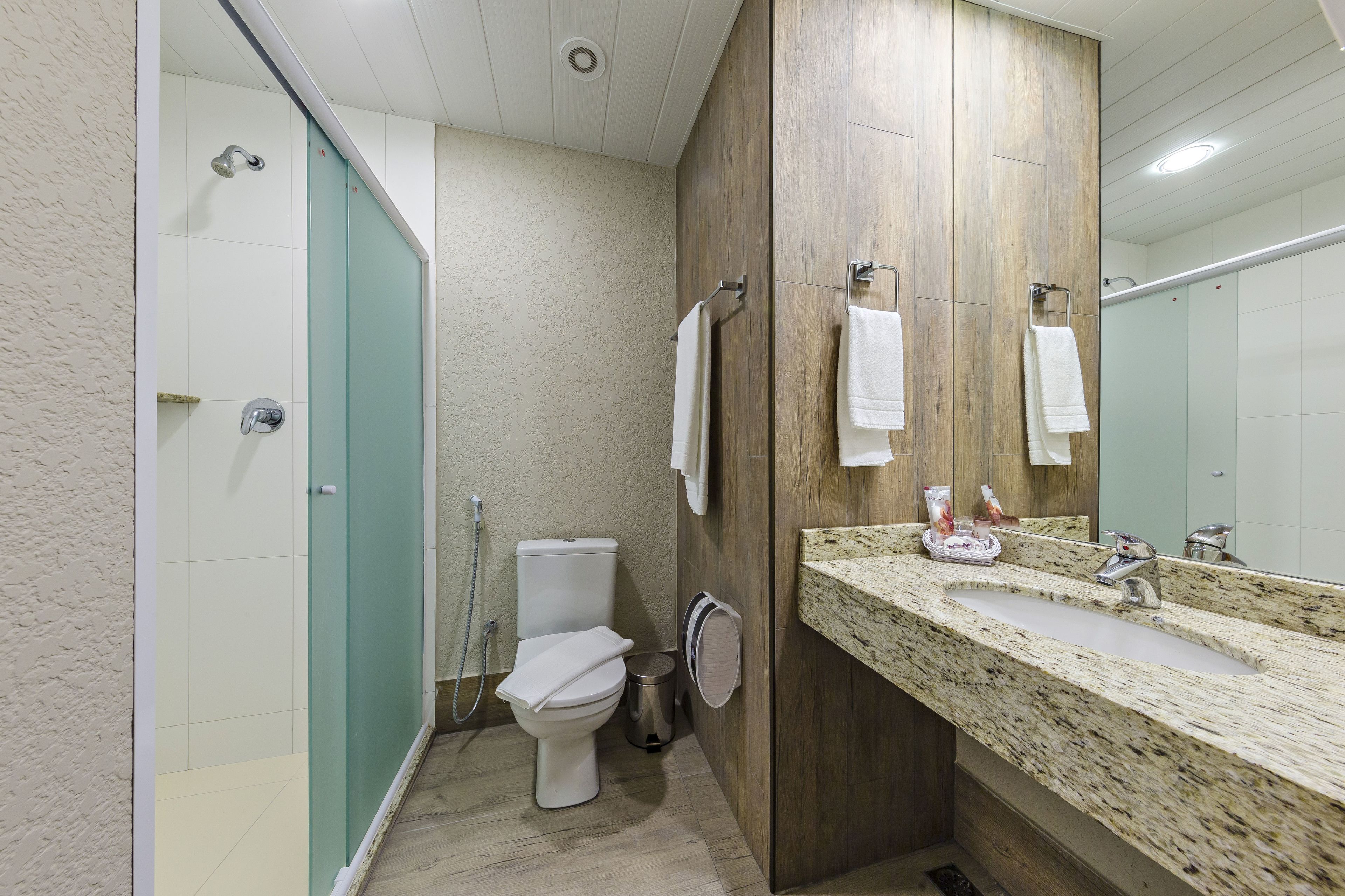 economy double room | bathroom | shower, free toiletries, hair dryer, towels