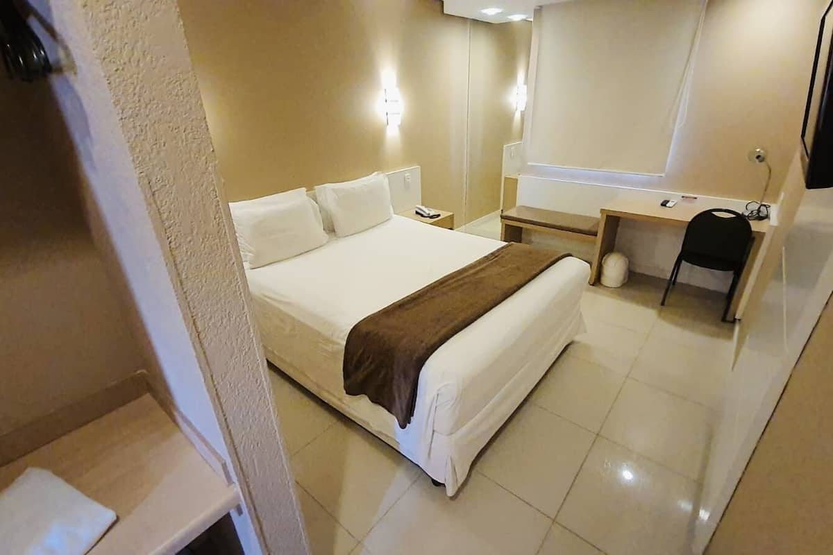 economy single room | minibar, in-room safe, desk, blackout curtains