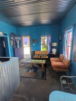 Turquoise Suite | Living area | 32-inch TV with satellite channels