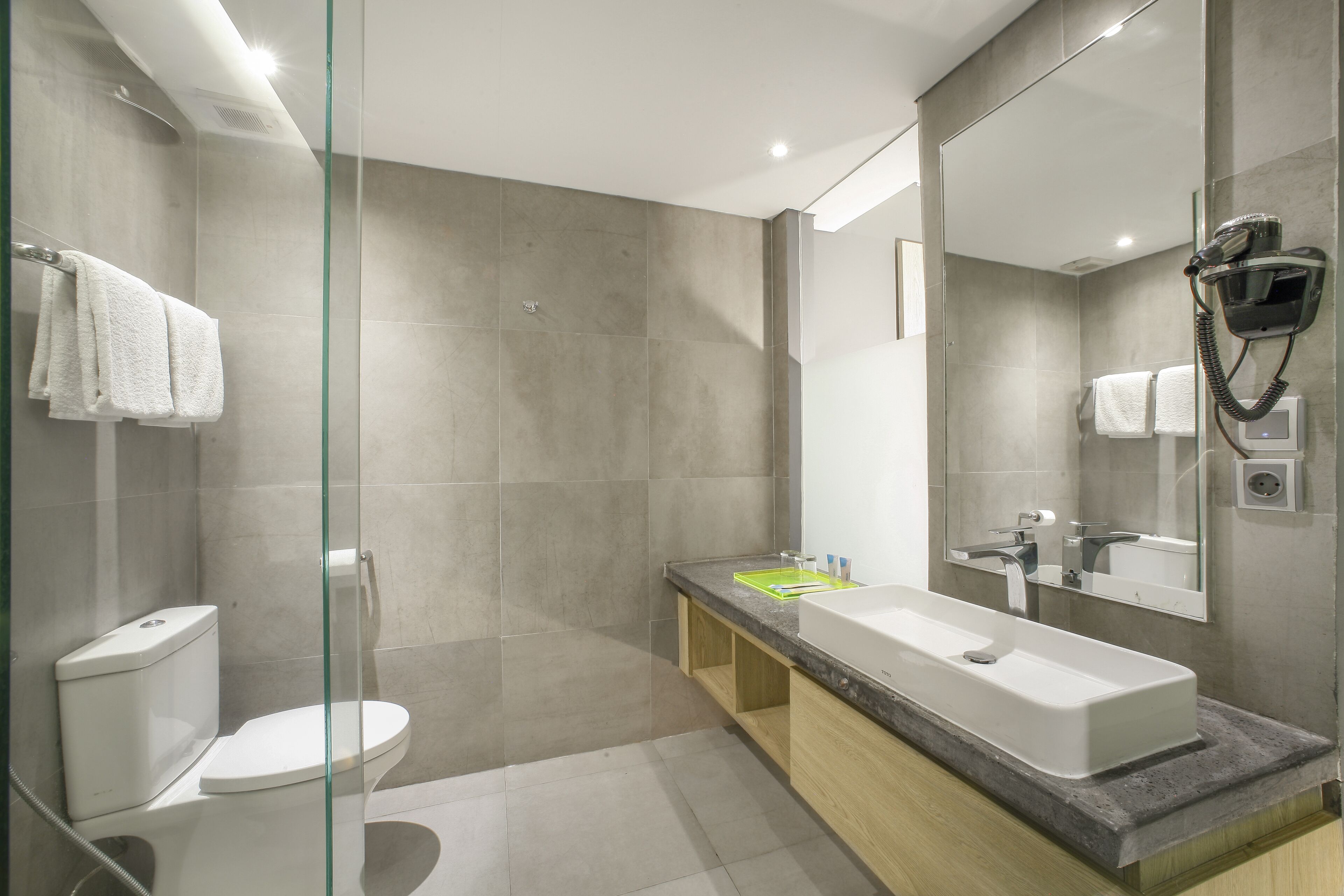 free toiletries, hair dryer, slippers, bidet