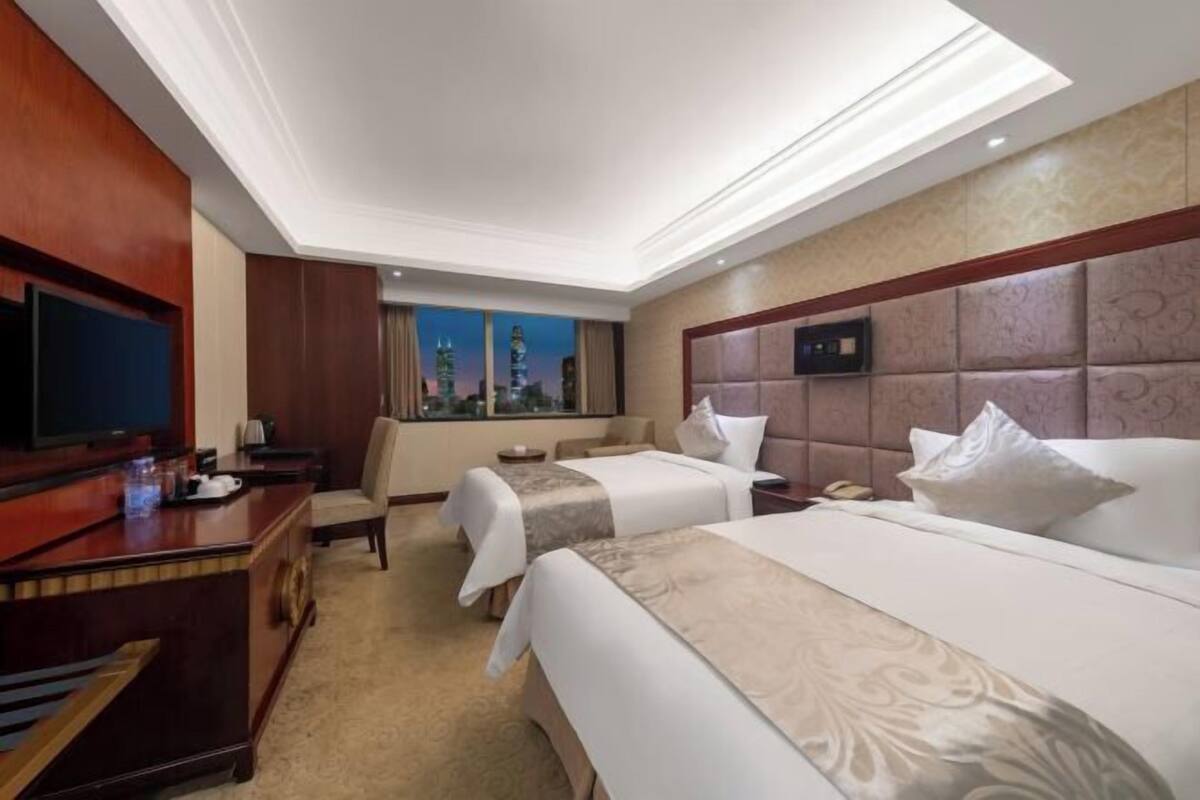Ropa de cama de alta calidad, minibar, caja fuerte y escritorio