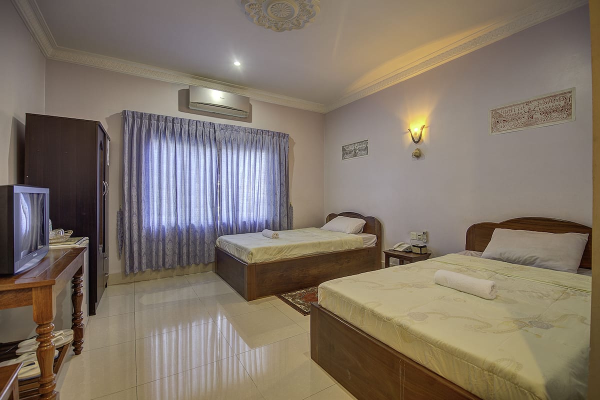 Standard Twin Room | Minibar, in-room safe, desk, soundproofing