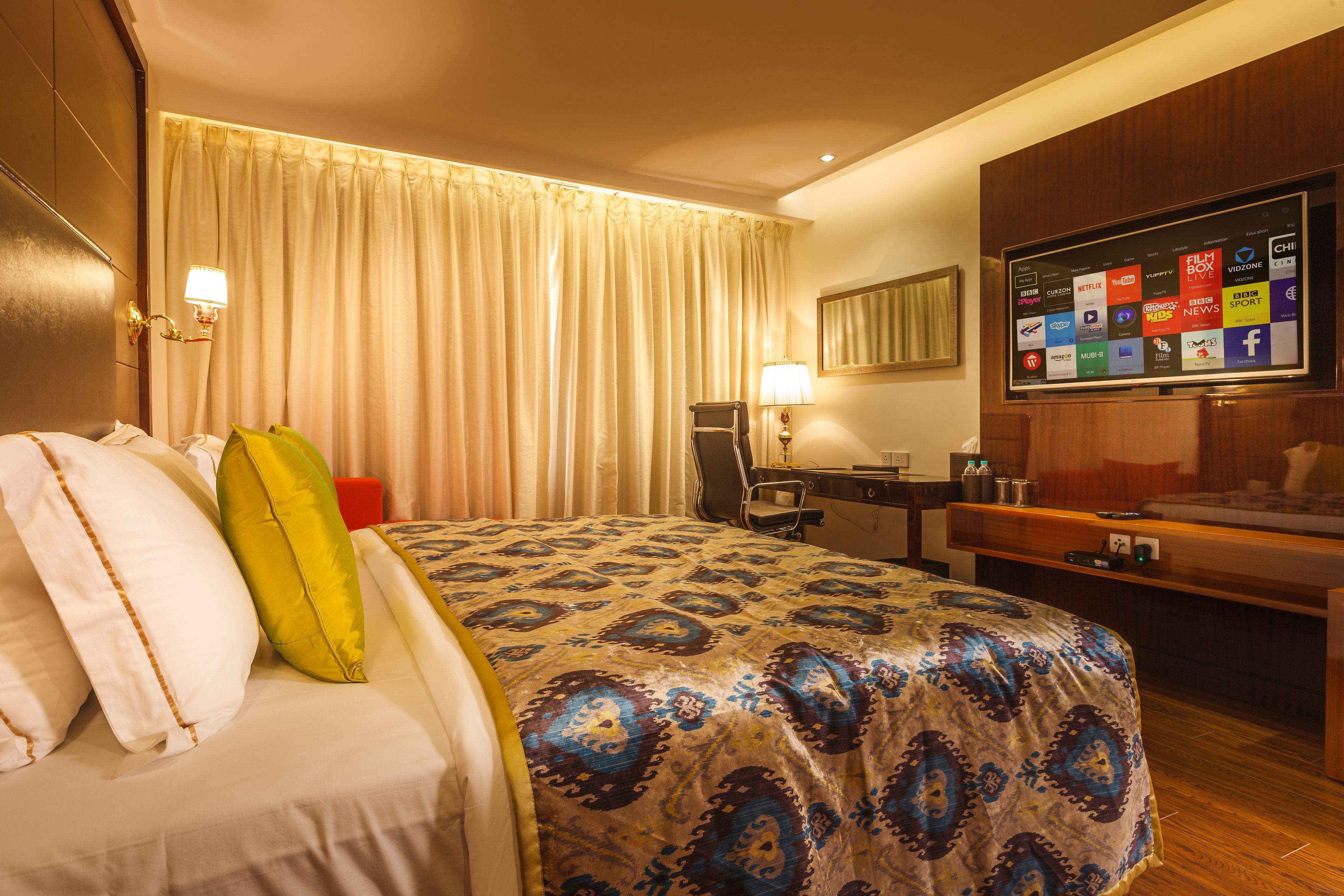 junior suite | in-room safe, desk, blackout curtains, soundproofing