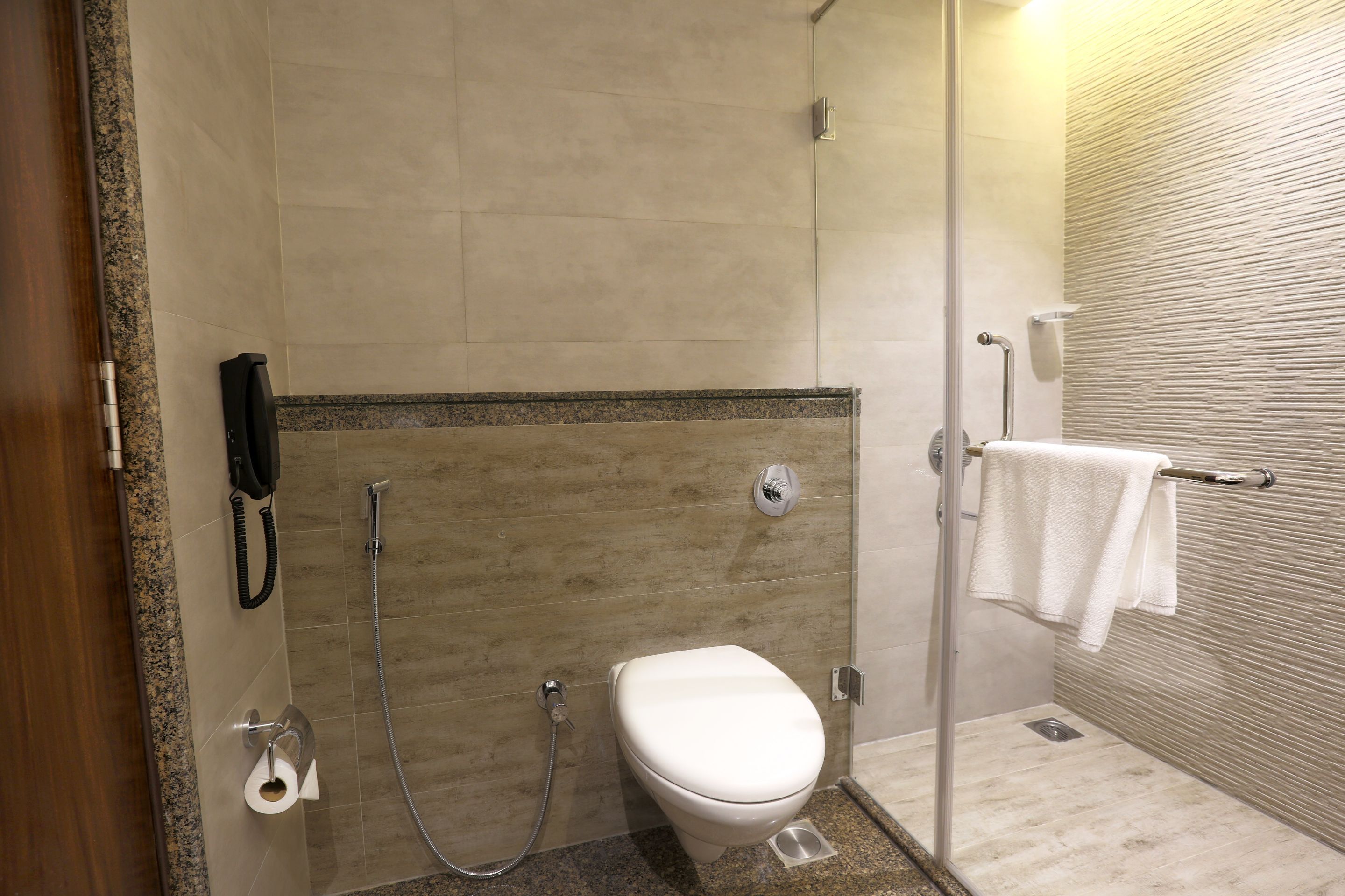 deluxe room | bathroom | shower, free toiletries, bathrobes, slippers
