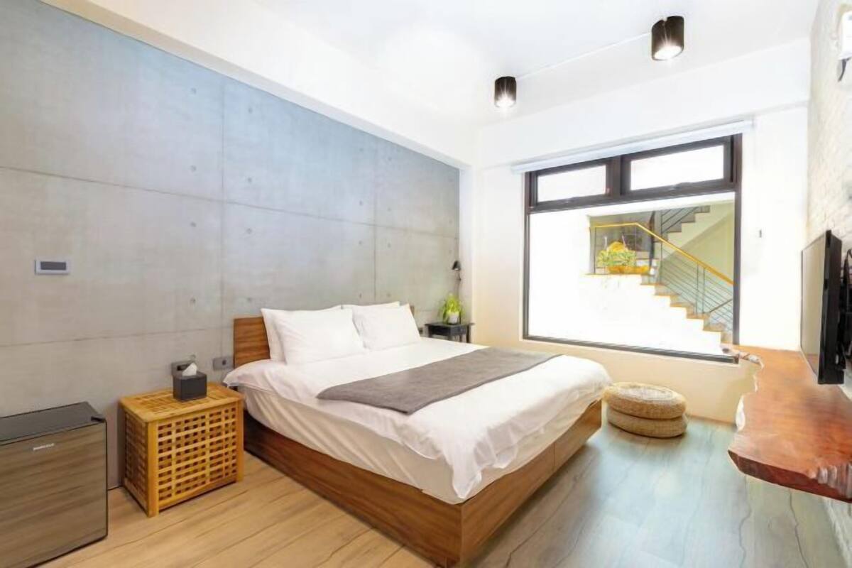 Premium bedding, memory foam beds, blackout drapes, soundproofing