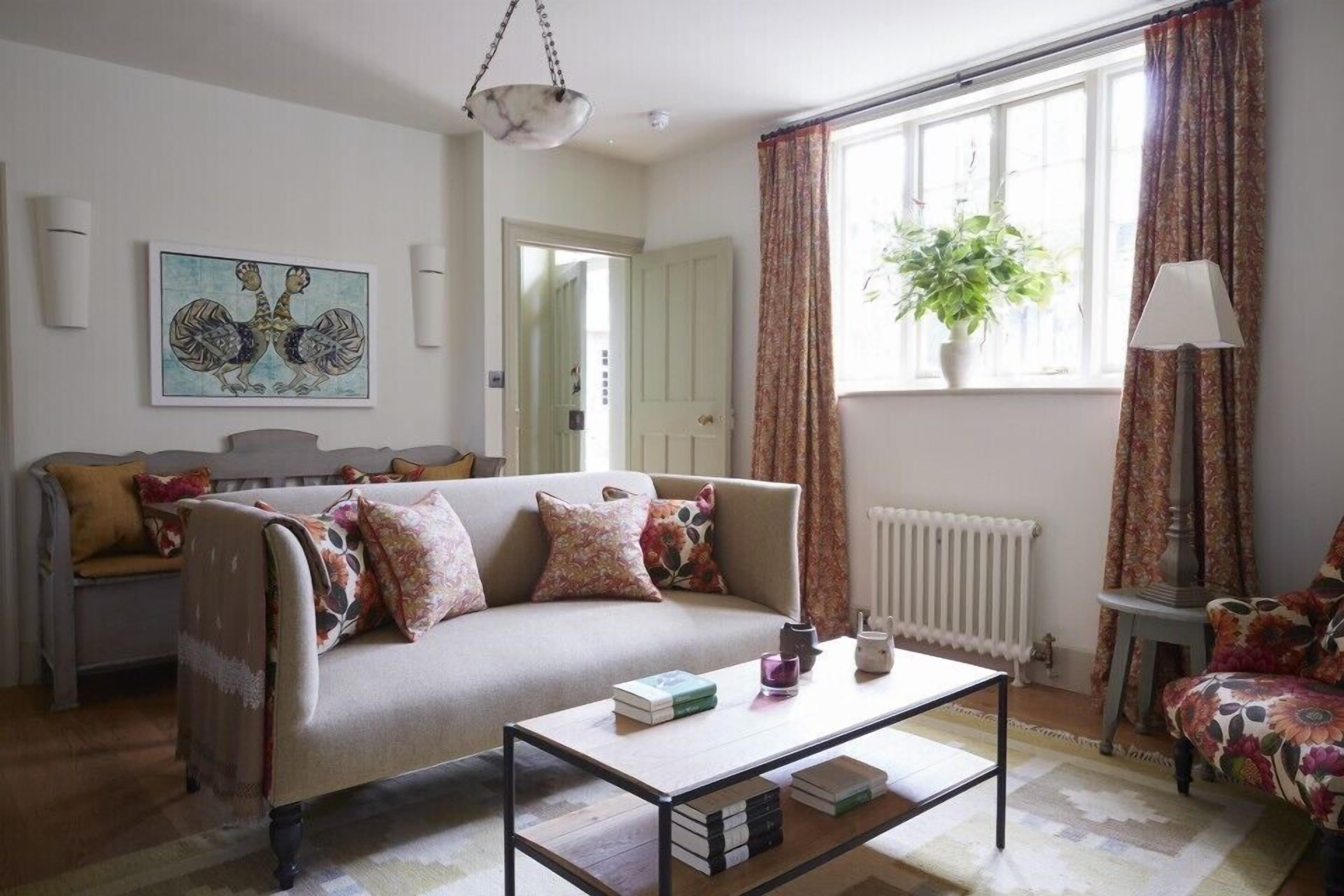 family suite | living area | 32-inch flat-screen tv with digital channels, tv, fireplace