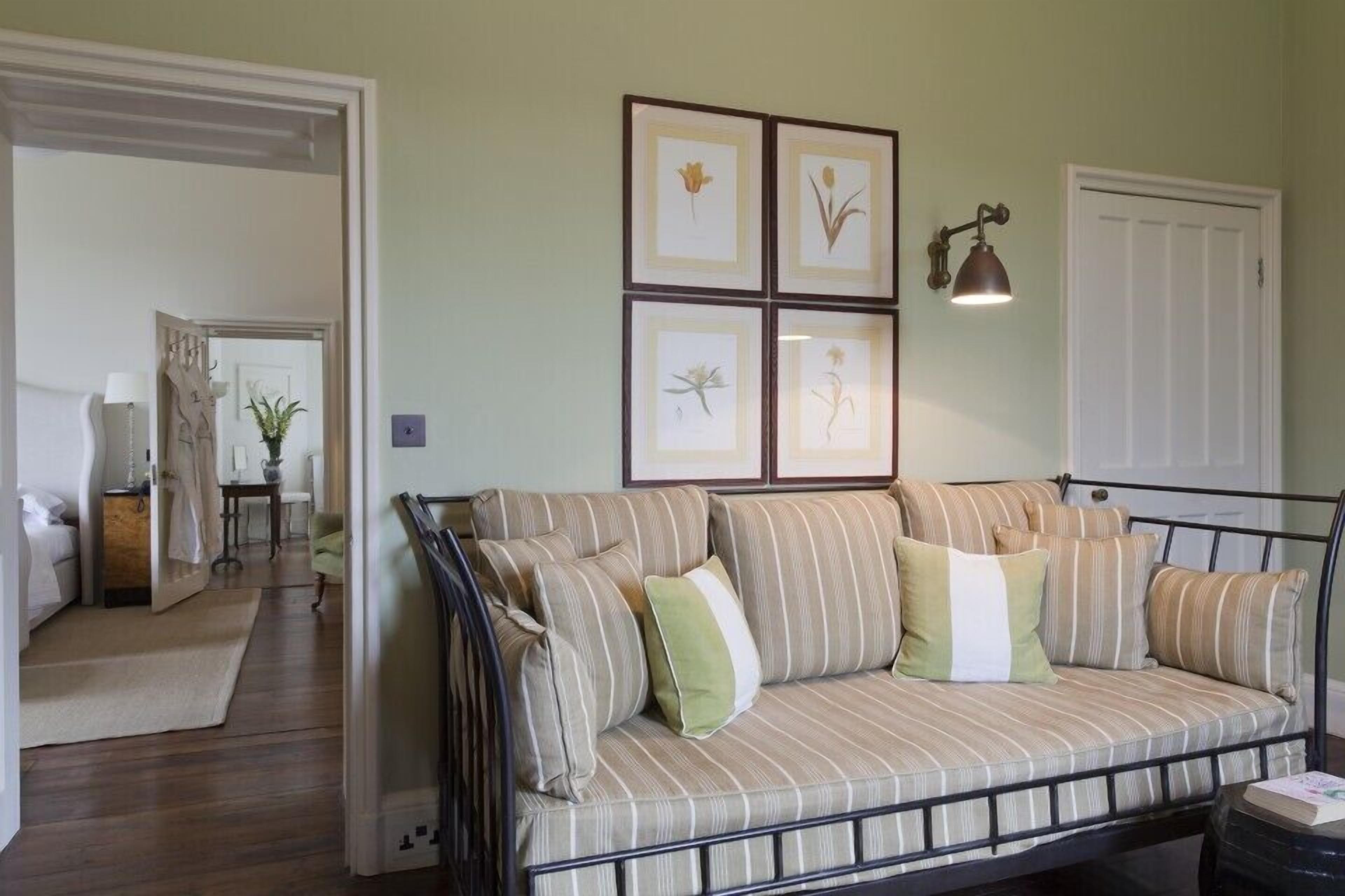 suite, garden view | living room | 32-inch flat-screen tv with digital channels, tv, fireplace