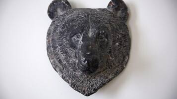 A bear head mounted on a wall.