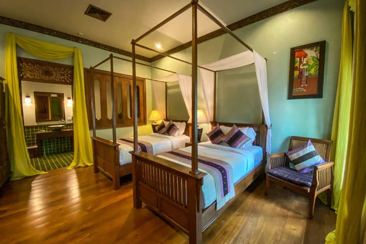 deluxe twin room | 1 bedroom, pillow-top beds, in-room safe, individually decorated