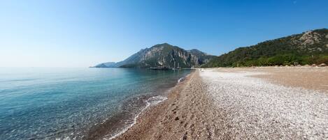 Private beach nearby, sun-loungers, beach umbrellas