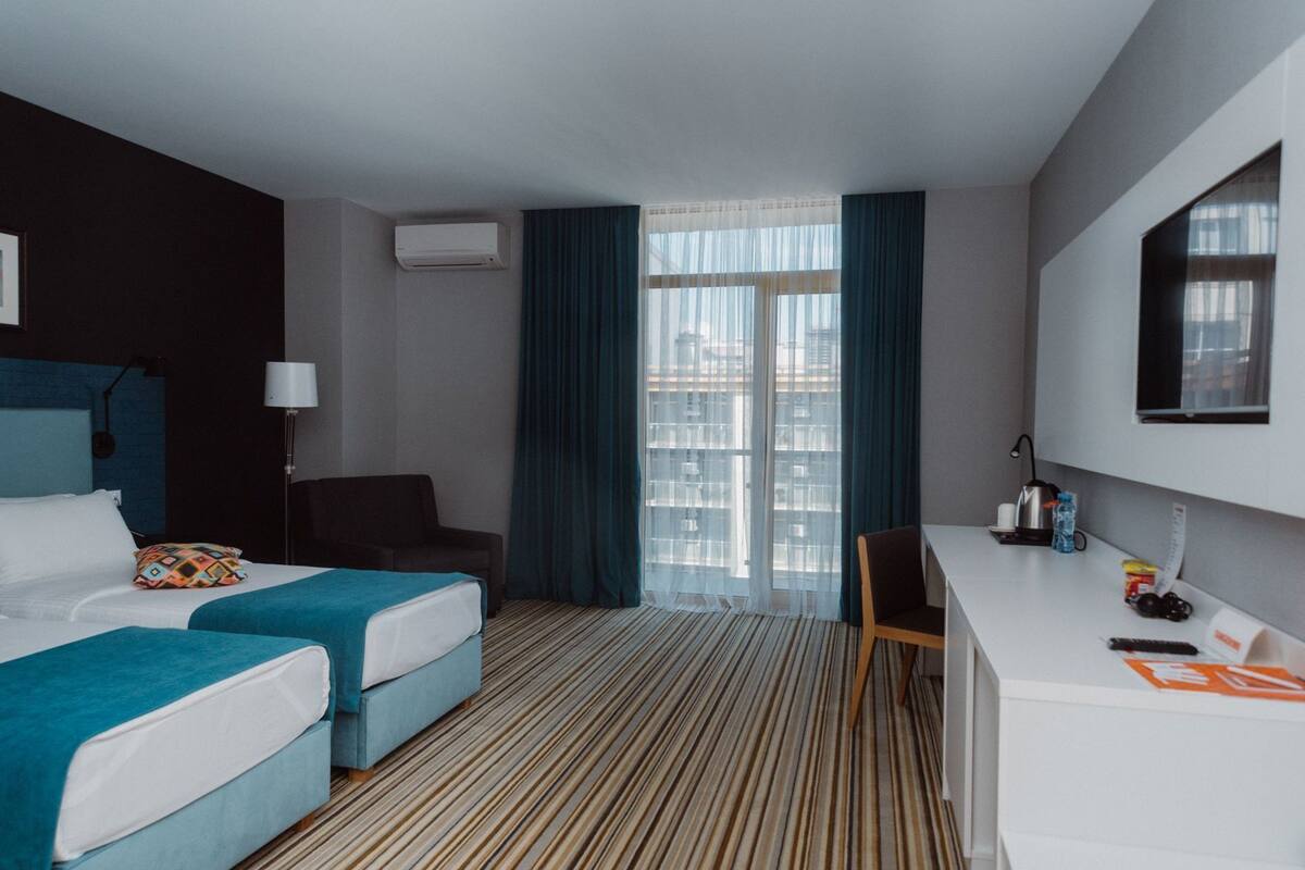 Premium bedding, pillowtop beds, minibar, in-room safe