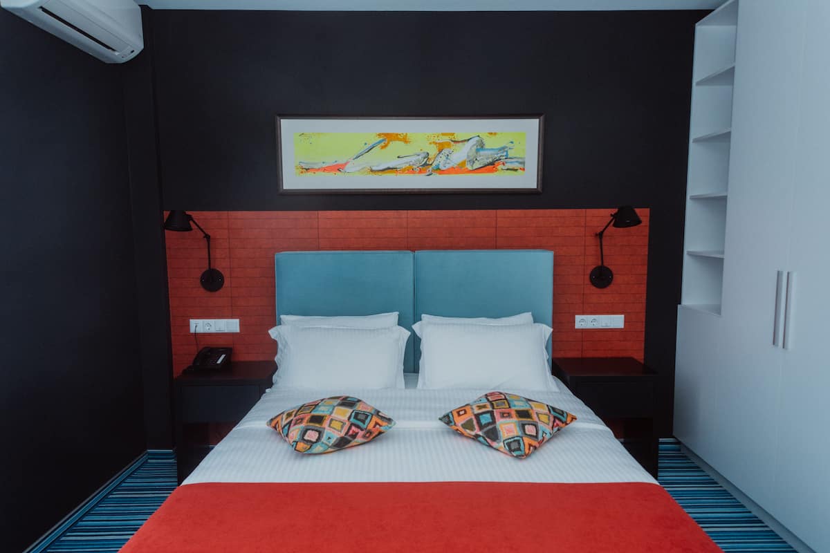 Premium bedding, pillow-top beds, minibar, in-room safe
