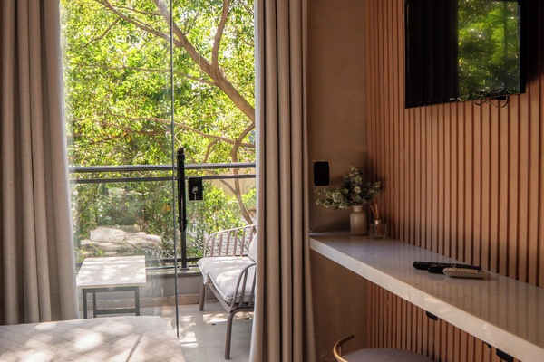 Standard Suite, 1 Queen Bed | Blackout drapes, iron/ironing board (on request), bed sheets