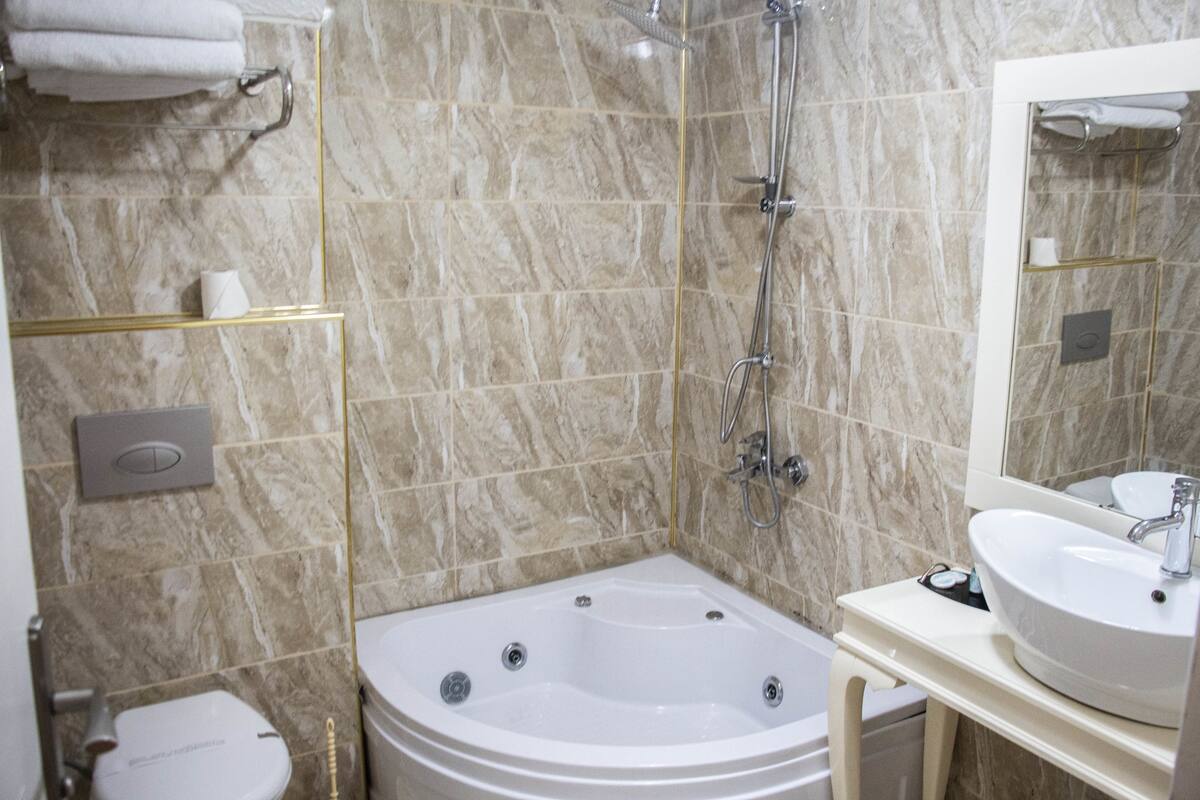 Hair dryer, slippers, towels, soap