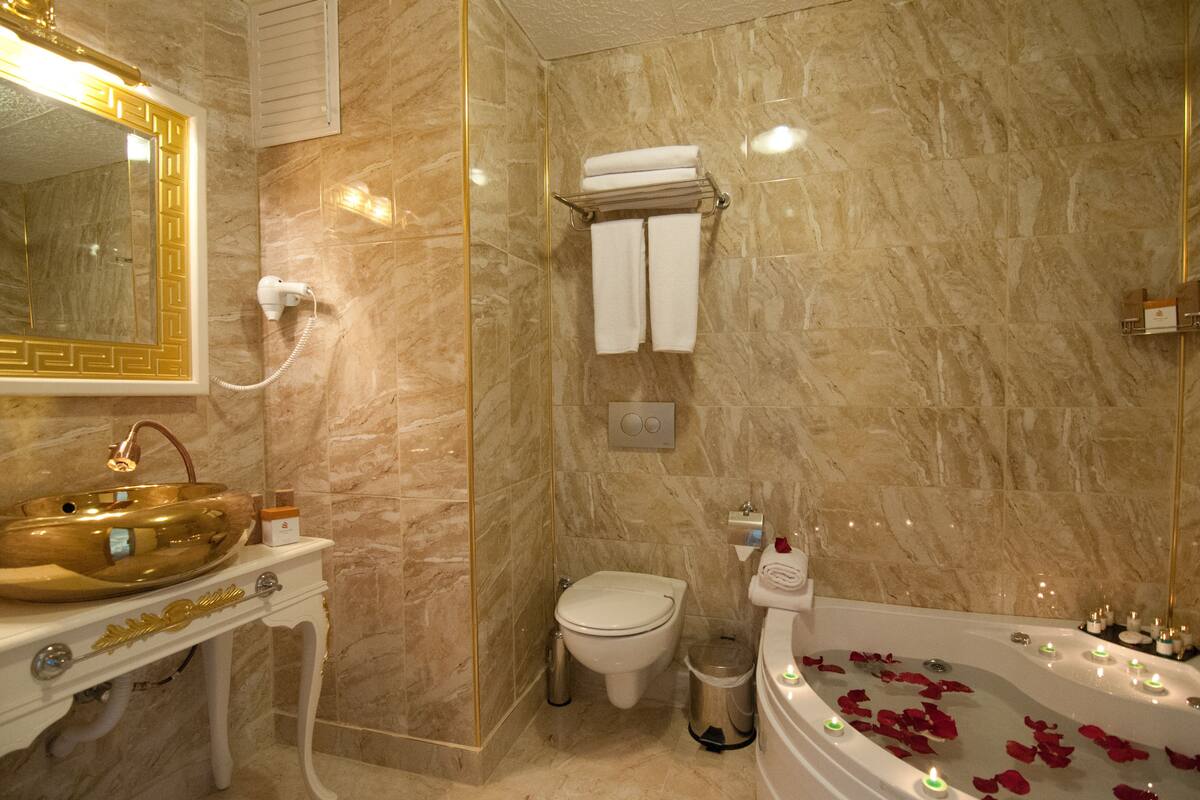 Hair dryer, slippers, towels, soap