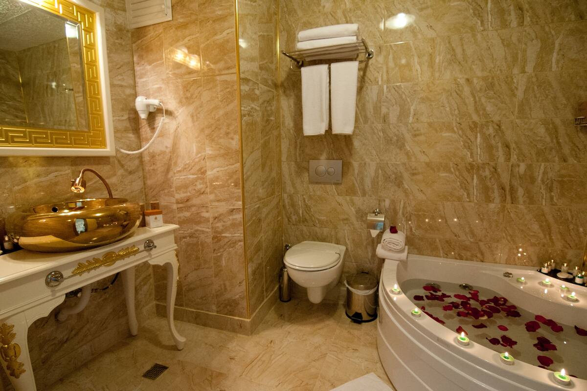 Hair dryer, slippers, towels, soap