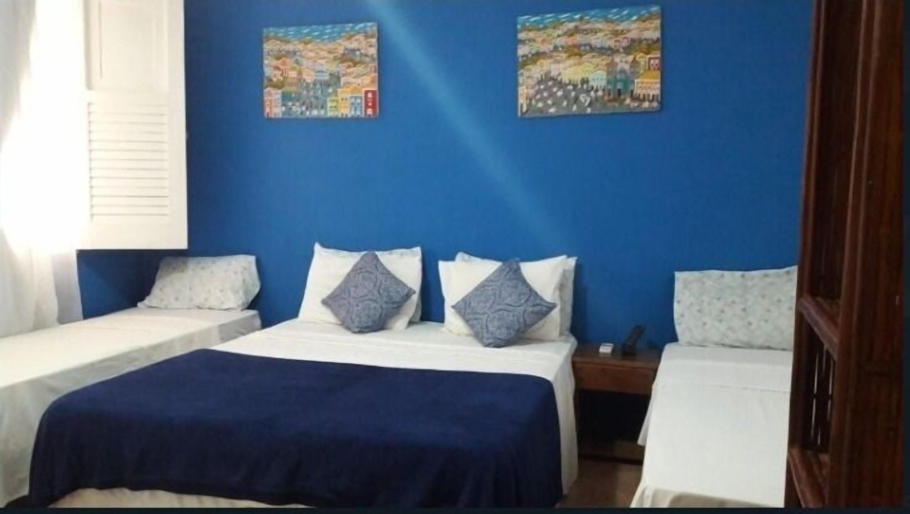 Frigobar, cortinas blackout, Wi-Fi de cortesia, roupa de cama