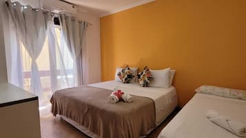 Quarto triplo | Frigobar, cortinas blackout, Wi-Fi de cortesia, roupa de cama