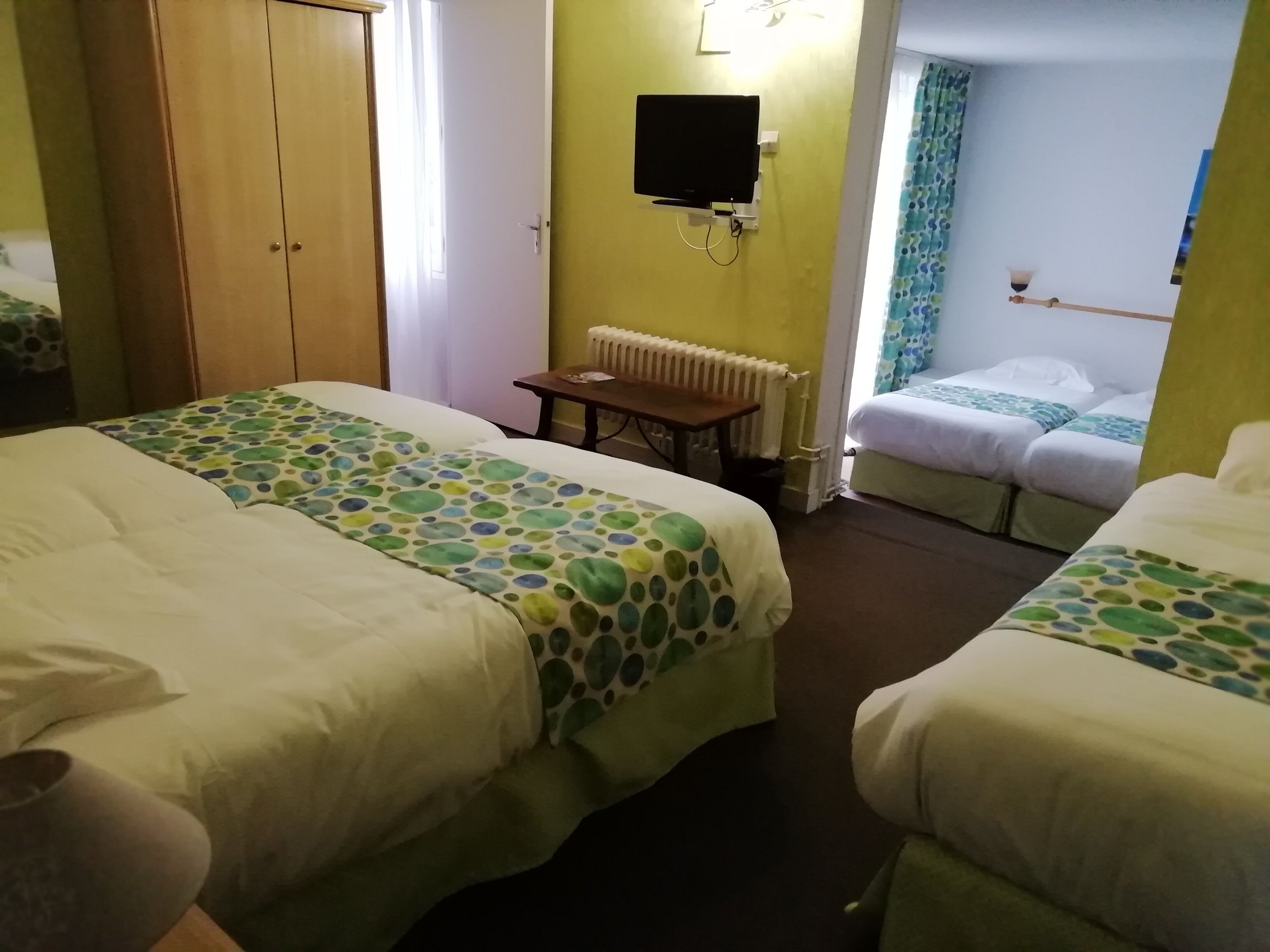 family room | premium bedding, select comfort beds, desk, iron/ironing board