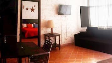 Suite, 1 Bedroom | Living area | Flat-screen TV