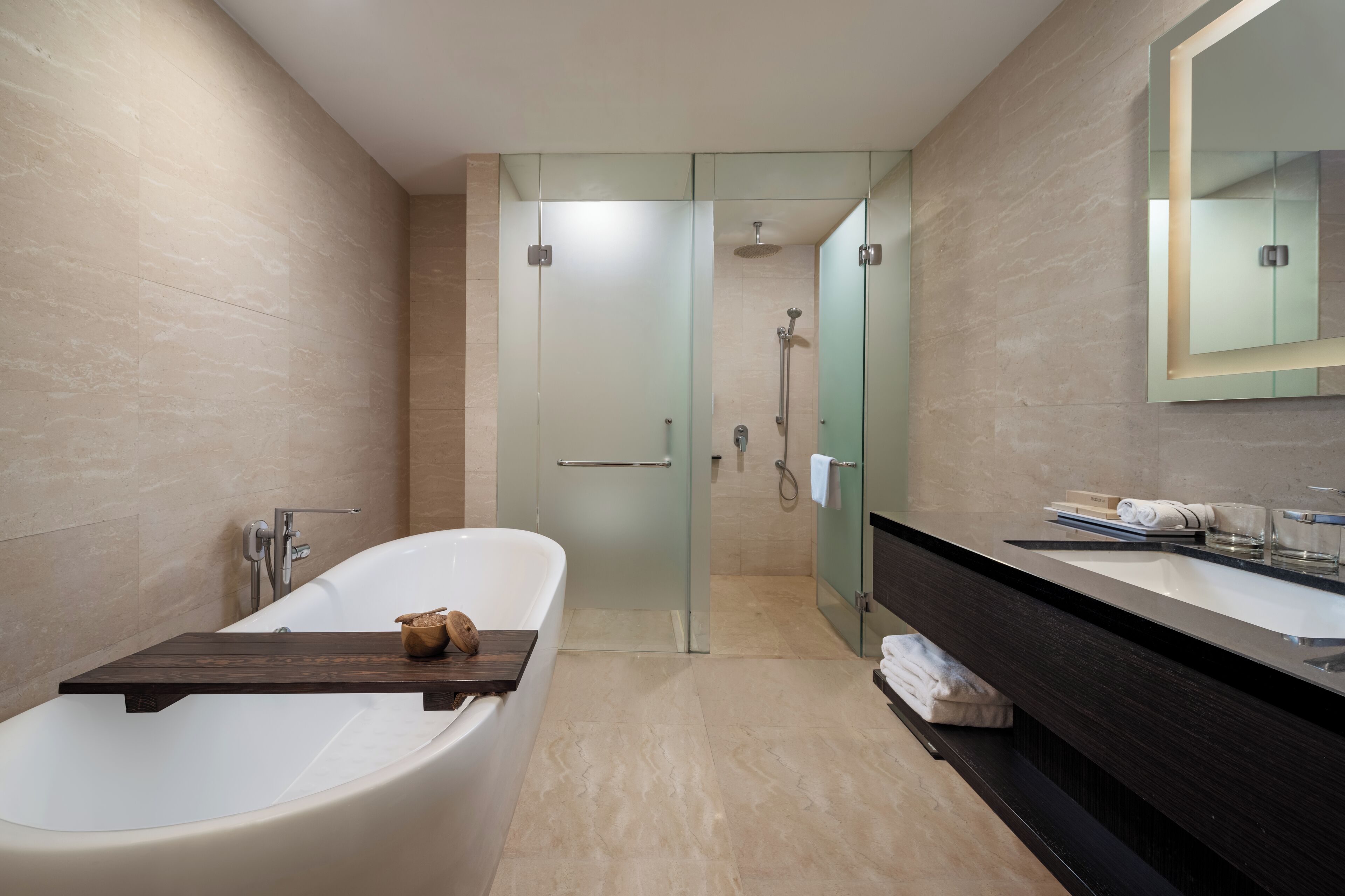 junior suite | bathroom amenities | shower, rainfall showerhead, eco-friendly toiletries, hair dryer
