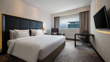 Minibar con artículos gratuitos, caja fuerte, escritorio