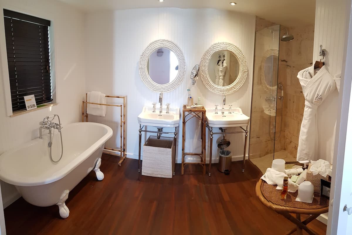 family suite - sea view - colombier hill | bathroom | designer toiletries, hair dryer, bathrobes, slippers