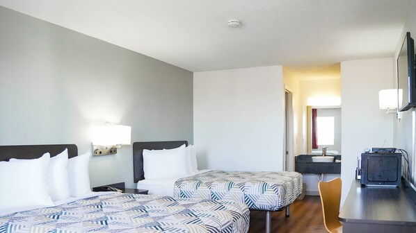 Deluxe-rum - 2 queensize-sängar - icke-rökare - kylsk åp och mikrovågsugn | Gratis wi-fi och sängkläder