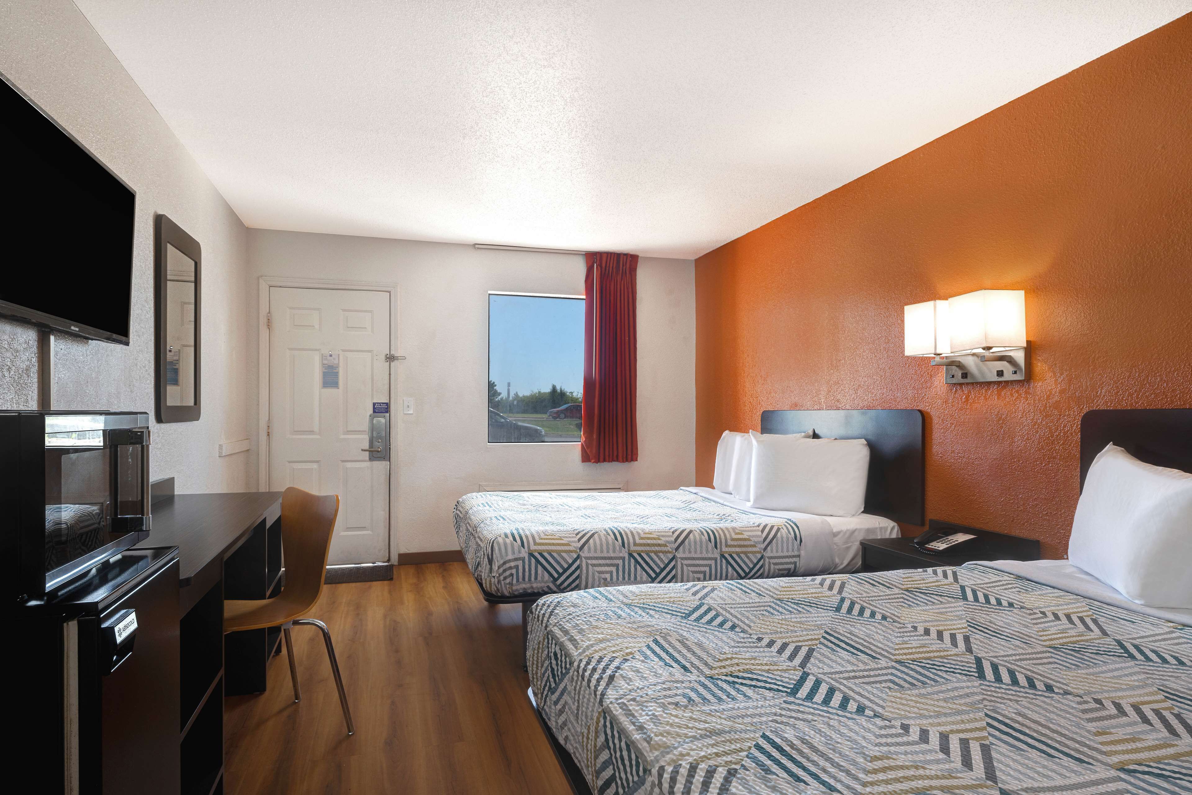 Deluxe Room, 2 Queen Beds, Non Smoking, Refrigerator & Microwave | Free WiFi, bed sheets