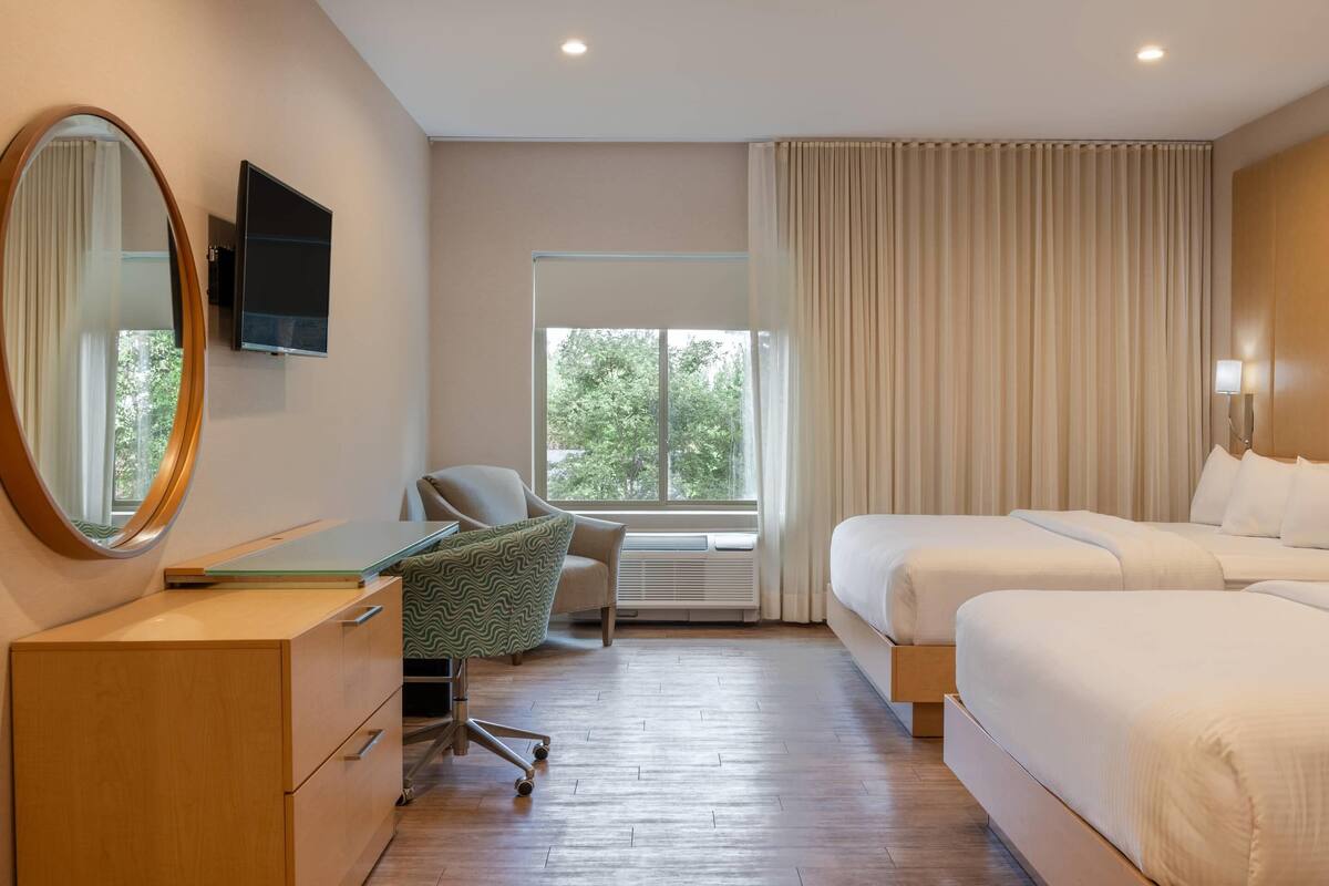 Standard Room, 2 Queen Beds, Non Smoking | Premium bedding, in-room safe, desk, laptop workspace