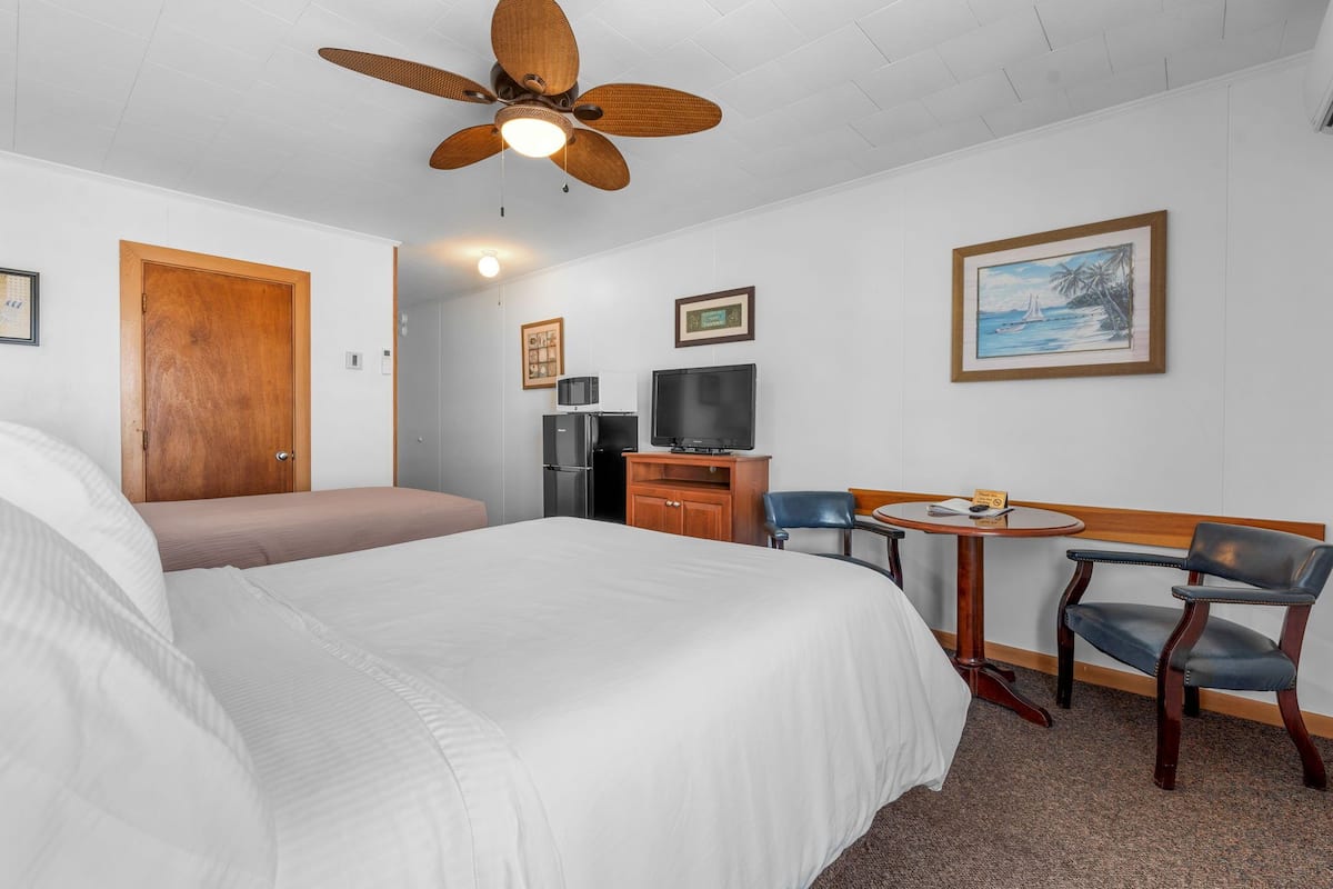 Sleeping Unit, 1 Double and 1 Single Bed | In-room safe, individually decorated, blackout drapes