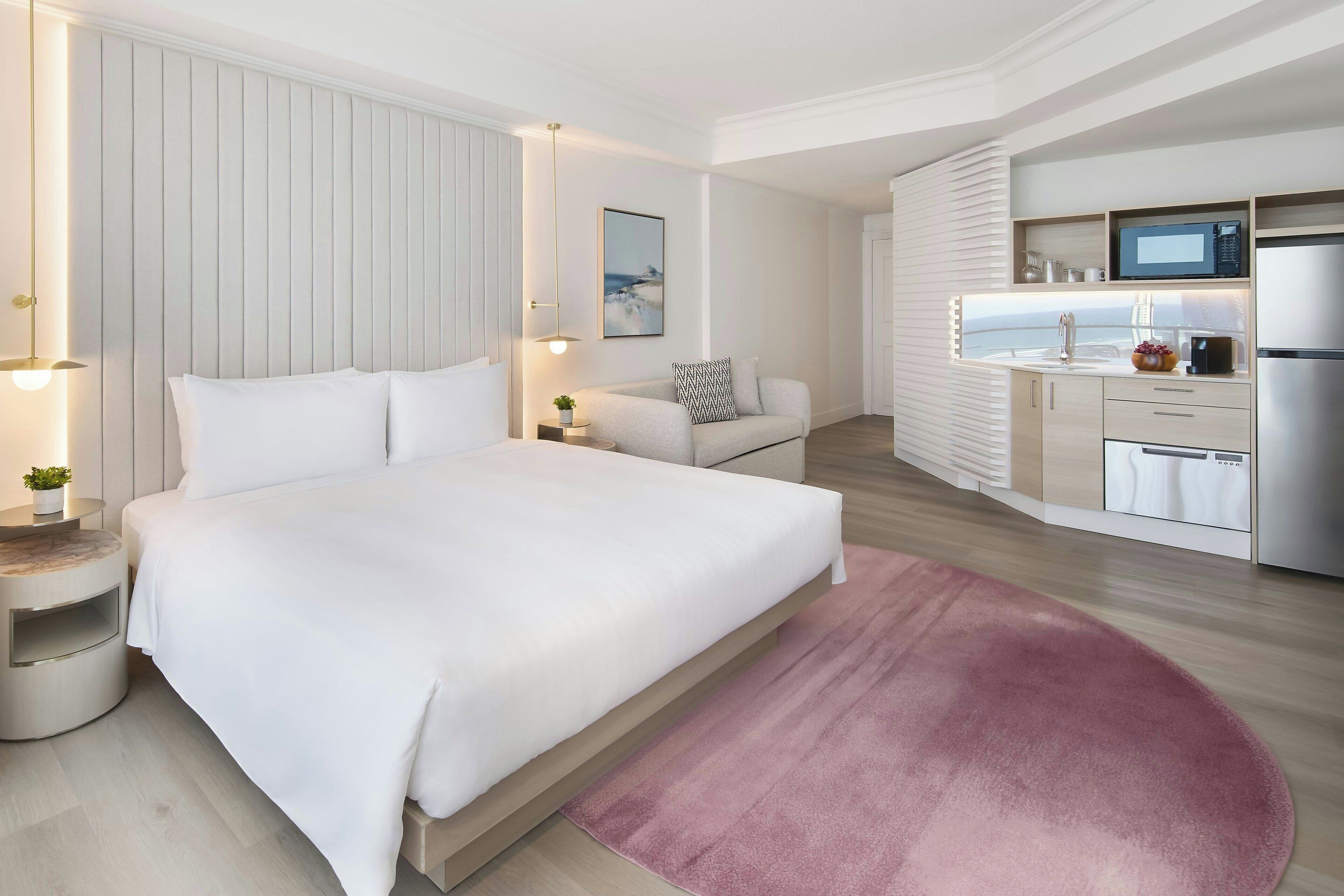 Microwave, electric kettle, cookware/dishes/utensils, dining tables