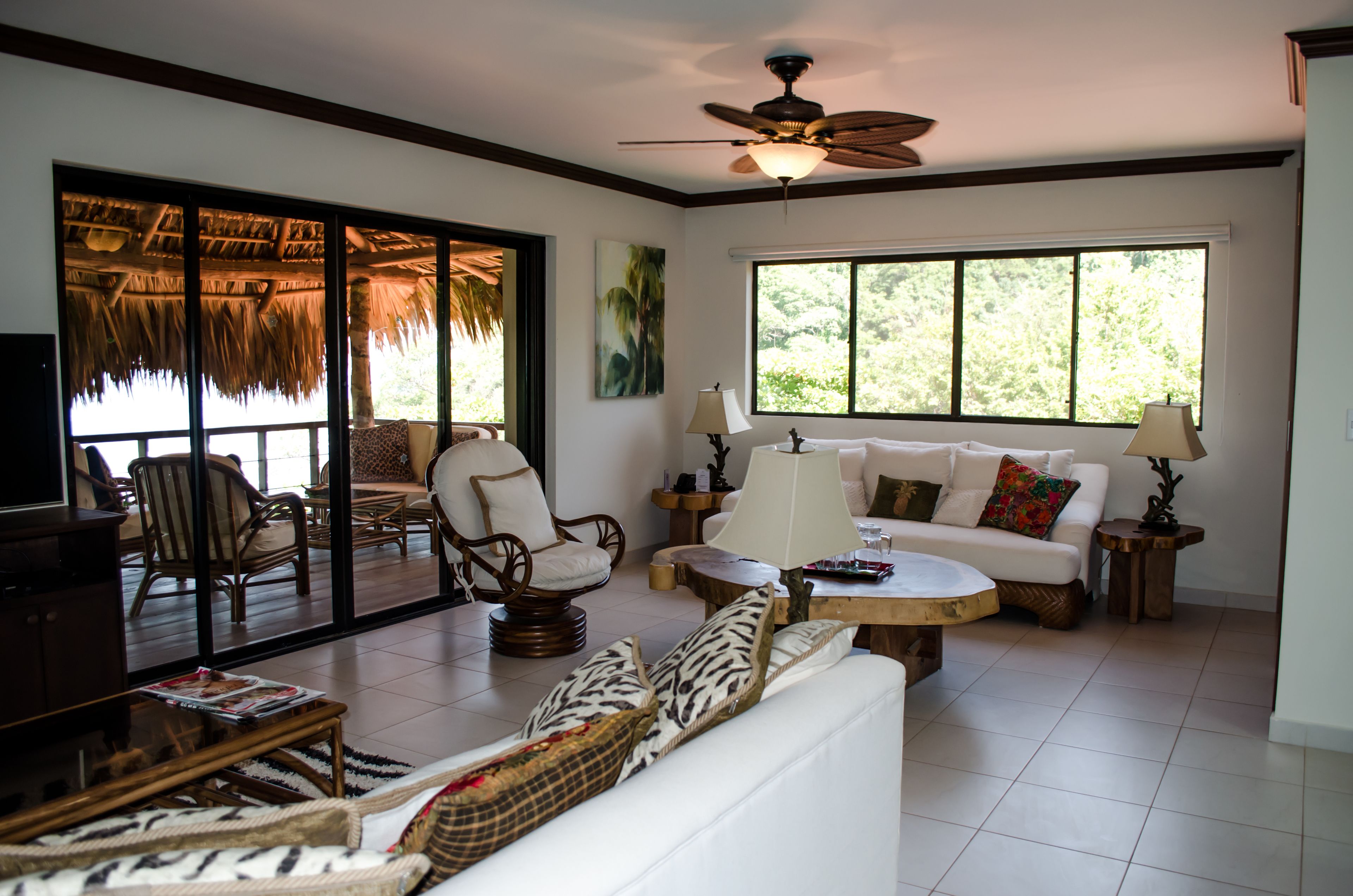 luxury villa, 2 bedrooms, terrace, ocean view | living area | 42-inch flat-screen tv with satellite channels, tv, table football